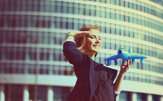 Woman toy airplane glass window free wallpaper for desktop - medium preview image