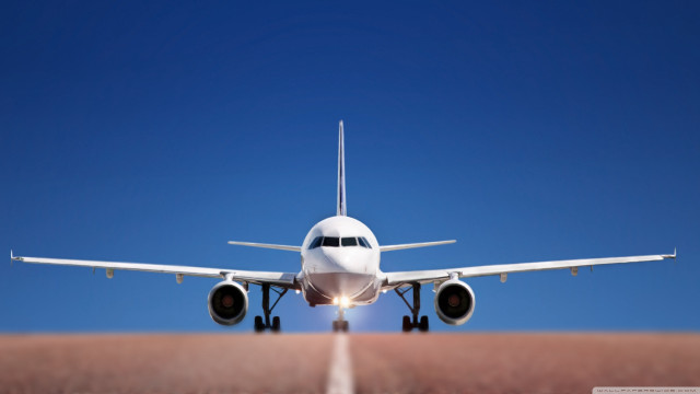 Large jetliner blue sky desert free wallpaper for desktop - medium preview image