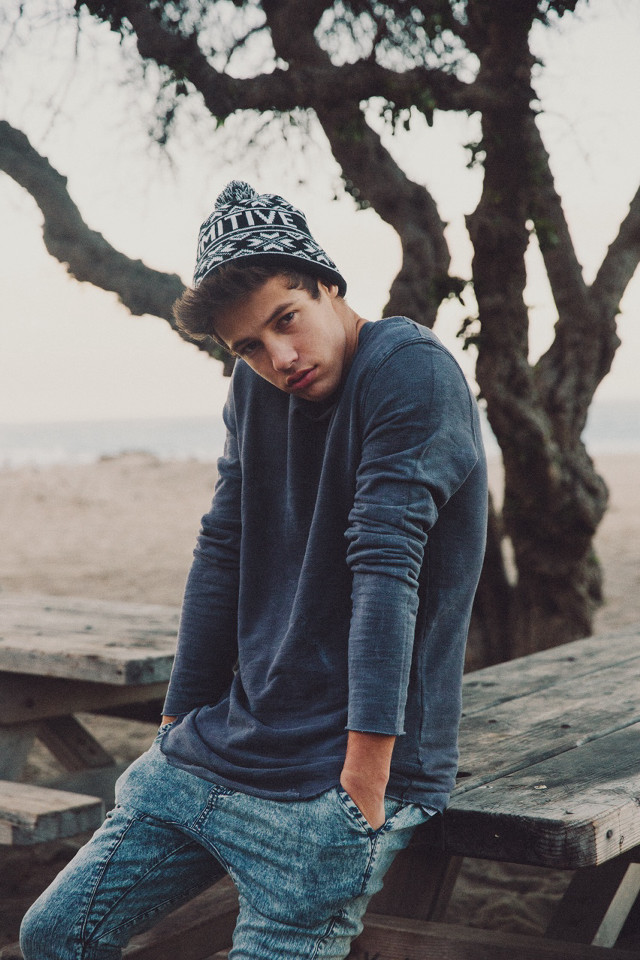 Young man picnic table hat free wallpaper for mobile - medium preview image