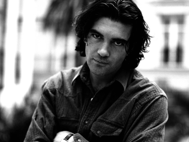 Man longhair leaning railing portrait free wallpaper for desktop - medium preview image