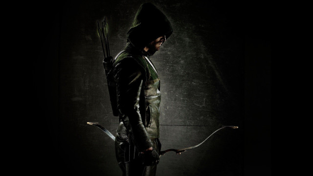 Man green outfit bow arrow free wallpaper for desktop - medium preview image