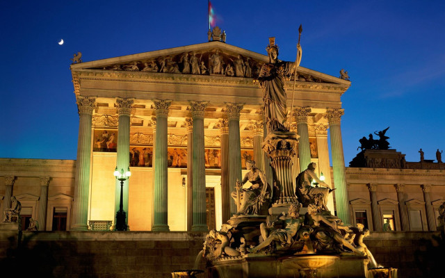 Building statue nighttime full moon free wallpaper for desktop - medium preview image