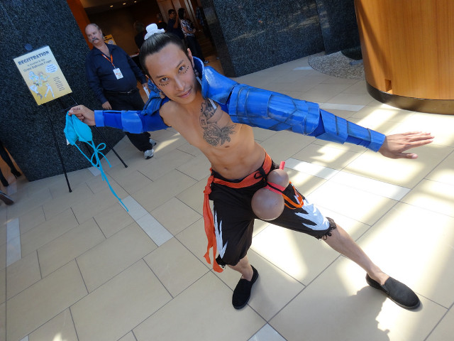 Man blue suit dancing tile free wallpaper for desktop - medium preview image