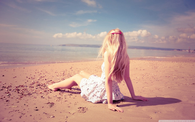 Woman beach hair blowing wind free wallpaper for desktop - medium preview image