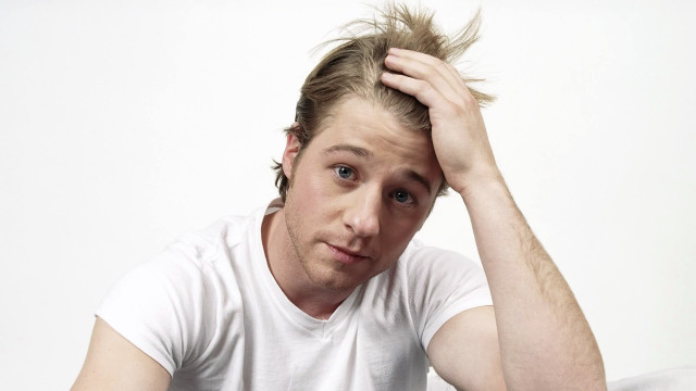 Messy hair man serious portrait free wallpaper for desktop - medium preview image