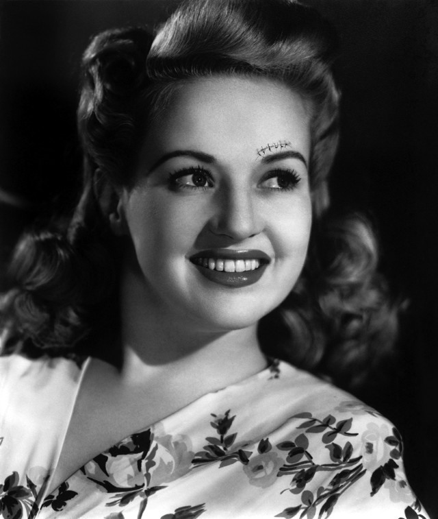 Smiling woman flowered dress chest free wallpaper for mobile - medium preview image