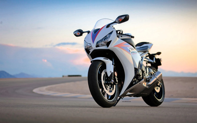 White motorcycle parked track sunset free wallpaper for desktop - medium preview image