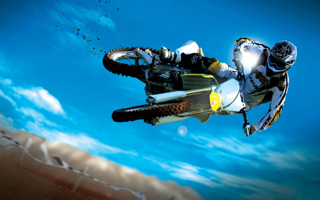 Man dirt bike air trick free wallpaper for desktop - medium preview image