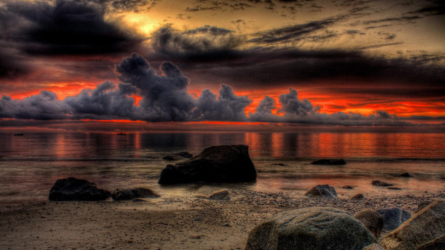 Sunset beach rocks water cloudy free wallpaper for desktop - medium preview image