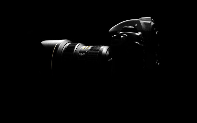 Camera lens attached dark image free wallpaper for desktop - medium preview image