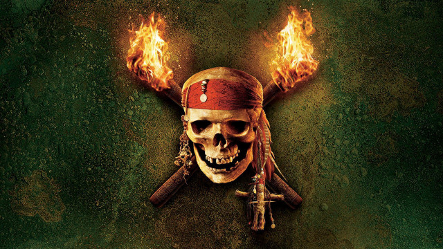 Skull pirate hat burning torches free wallpaper for desktop - medium preview image