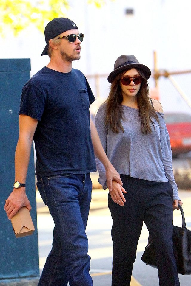 Man woman walking street holding free wallpaper for mobile - medium preview image