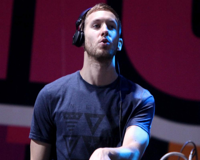 Man headphones microphone stand holding free wallpaper for desktop - medium preview image