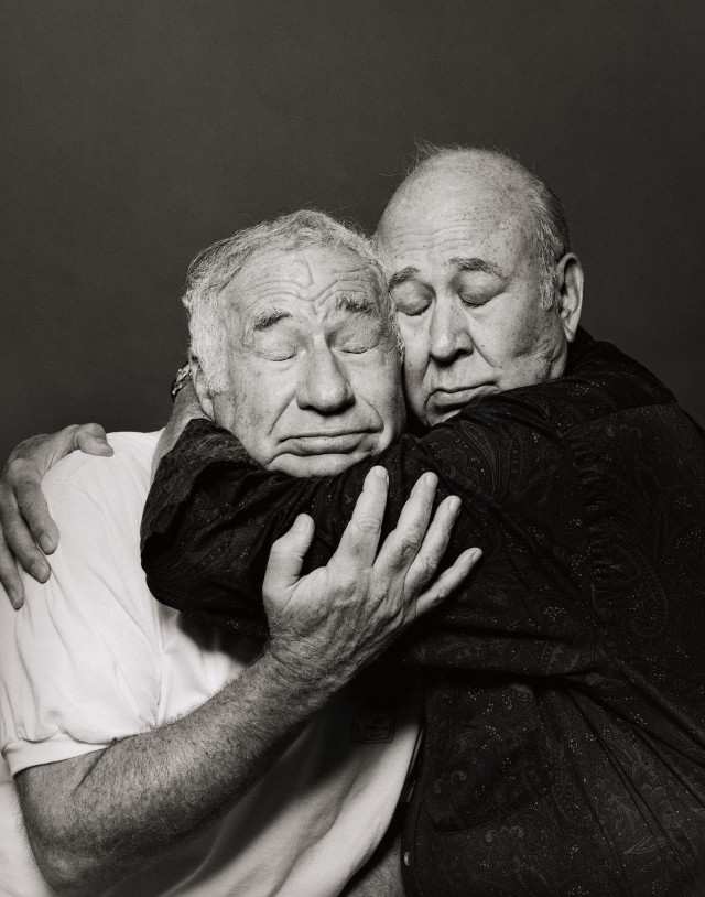 Elderly men hugging black white free wallpaper for mobile - medium preview image
