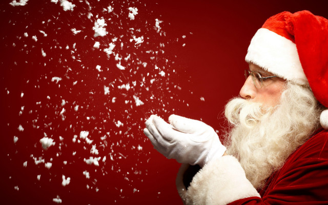 Santa claus blowing snow hands free wallpaper for desktop - medium preview image
