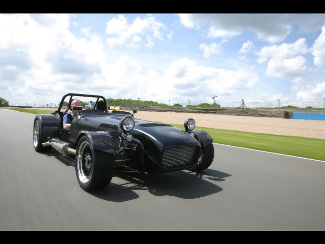 Man driving vintage car road #2 free wallpaper for desktop - medium preview image