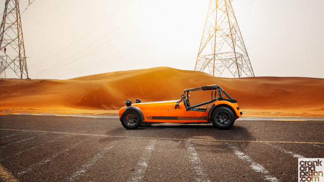 Orange car desert road power free wallpaper for desktop - medium preview image