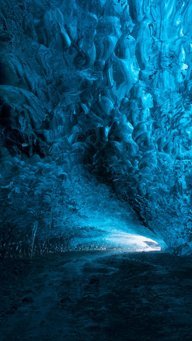 Man standing cave light blue free wallpaper for mobile - medium preview image