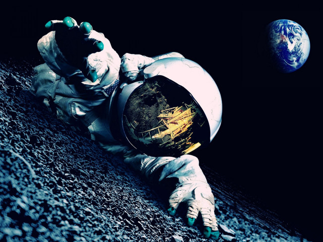 Astronaut laying earth blue planet free wallpaper for desktop - medium preview image