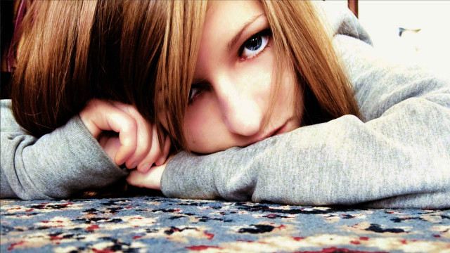 Woman laying bed hands head #2 free wallpaper for desktop - medium preview image