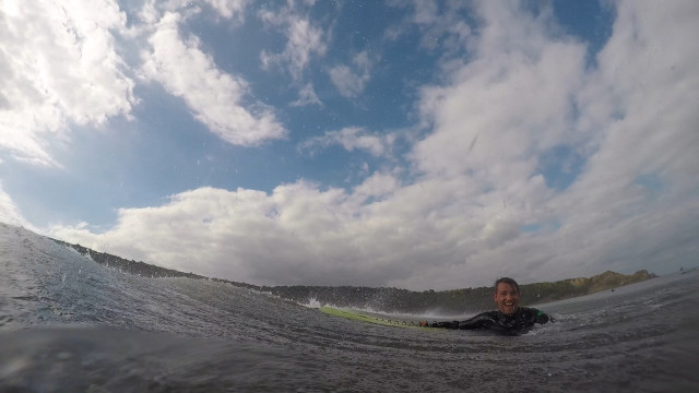 Man surfing wave ocean cloudy free wallpaper for desktop - medium preview image