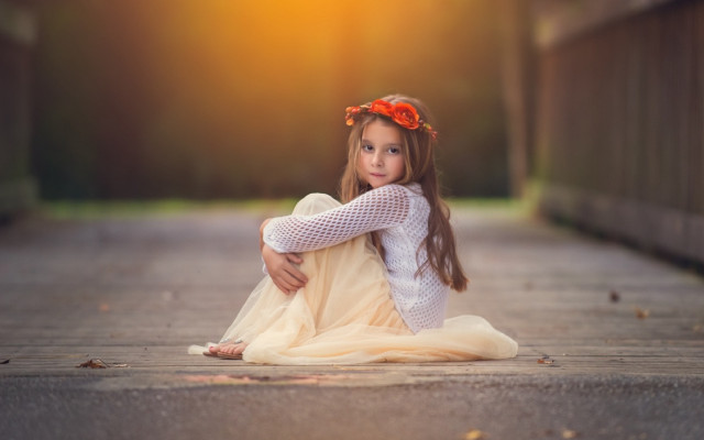 Little girl sitting arms crossed free wallpaper for desktop - medium preview image