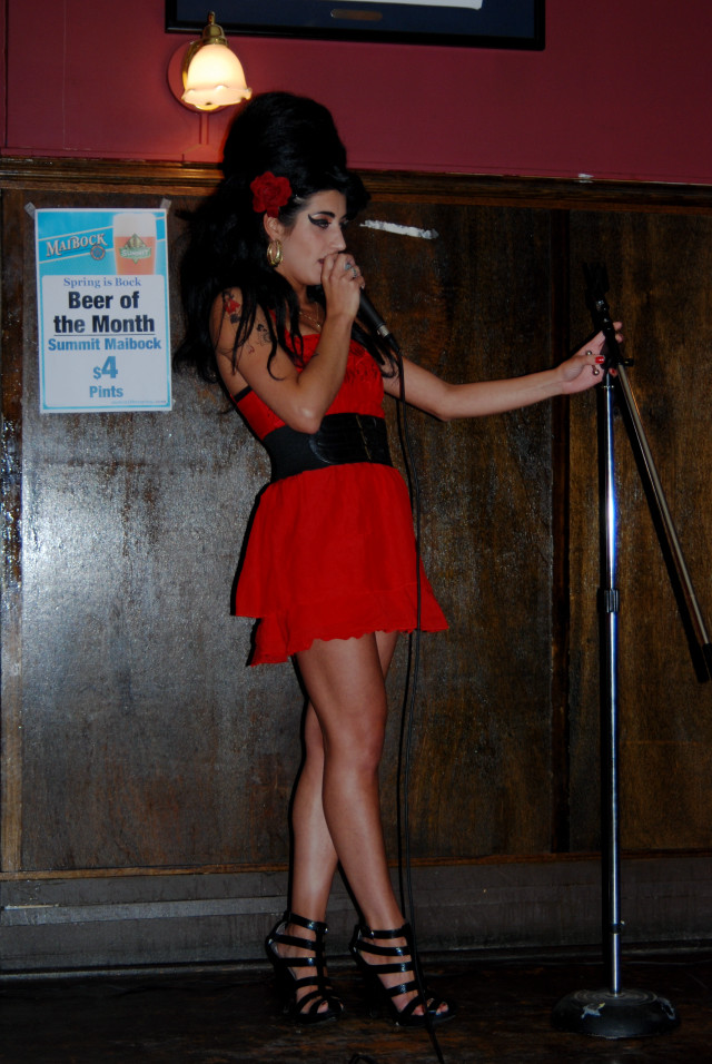 Woman red dress singing microphone free wallpaper for mobile - medium preview image