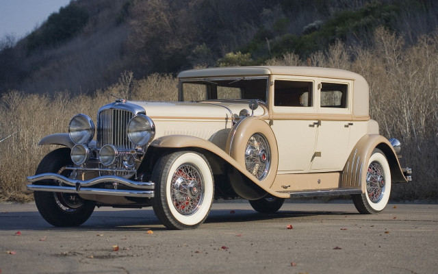 Old model car parked hill free wallpaper for desktop - medium preview image