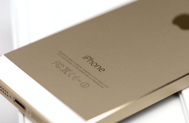 Iphone closeup white surface gold free wallpaper for desktop - medium preview image