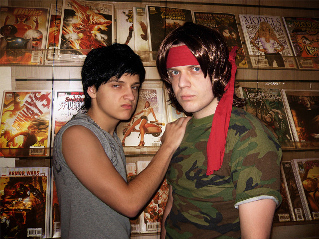 Man putting bandana another man free wallpaper for desktop - medium preview image