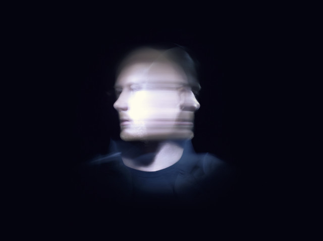 Man blurry face dark background free wallpaper for desktop - medium preview image