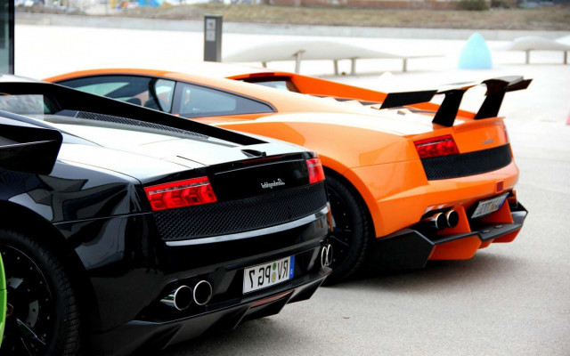 Orange black sports cars parking free wallpaper for desktop - medium preview image