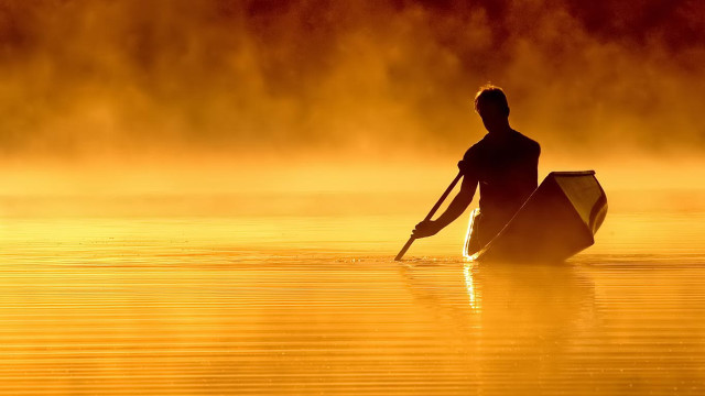 Man paddling canoe lake sunset #2 free wallpaper for desktop - medium preview image