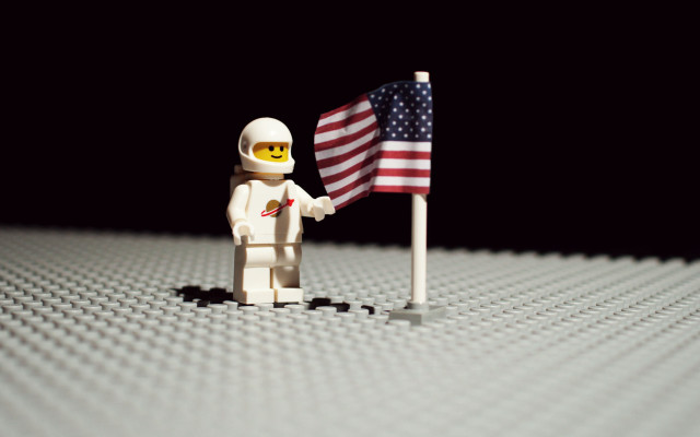 Lego man holding flag lego free wallpaper for desktop - medium preview image