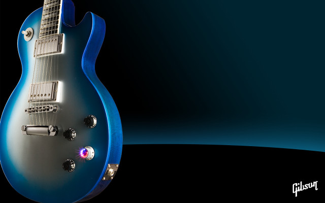 Blue electric guitar black background free wallpaper for desktop - medium preview image