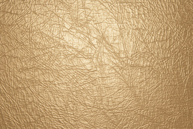 Gold leather texture grainy pattern free wallpaper for desktop - medium preview image