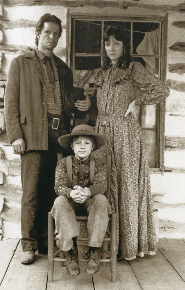 Man women child chair log free wallpaper for mobile - medium preview image