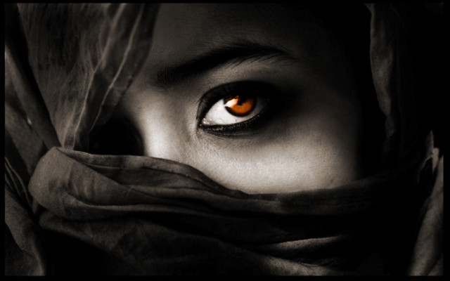 Woman orange eyes scarf serious free wallpaper for desktop - medium preview image