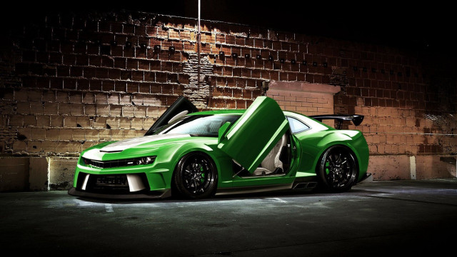 Green sports car brick room free wallpaper for desktop - medium preview image