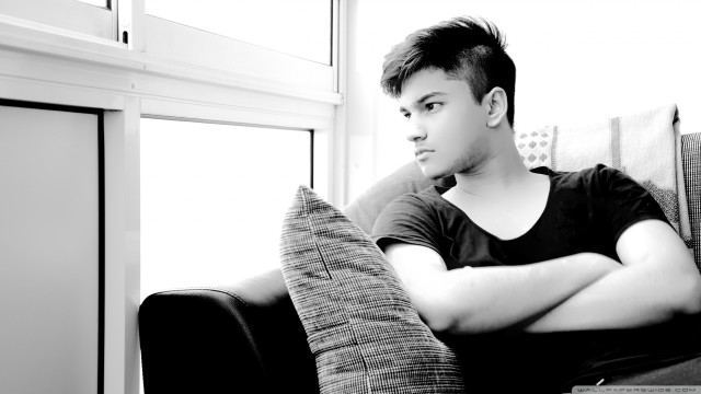 Man sitting couch arms crossed #2 free wallpaper for desktop - medium preview image