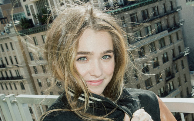 Woman purse balcony buildings city free wallpaper for desktop - medium preview image