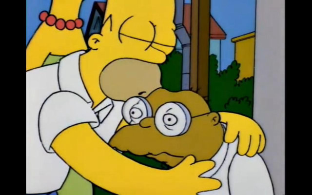 Man holding cartoon character head free wallpaper for desktop - medium preview image