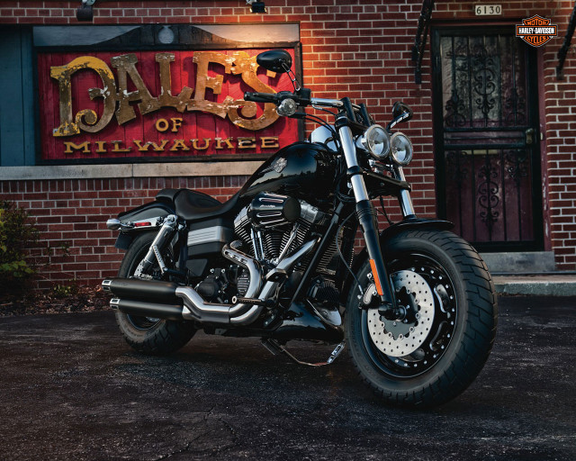 Motorcycle parked building dukes of free wallpaper for desktop - medium preview image