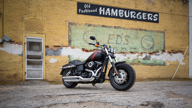 Motorcycle brick building hamburgerers helmet free wallpaper for desktop - medium preview image