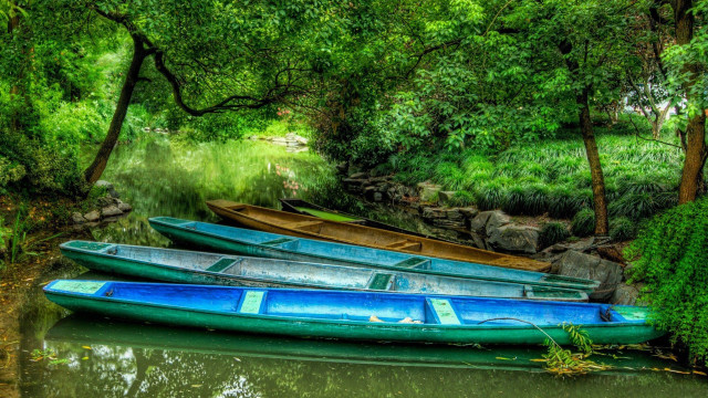 Three canoes river bank woods free wallpaper for desktop - medium preview image