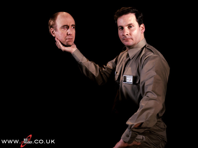 Two men in uniforms posing free wallpaper for desktop - medium preview image