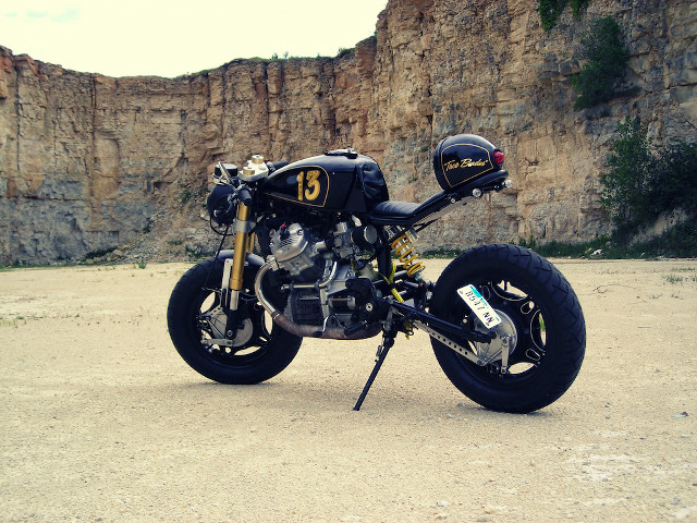 Motorcycle parking lot mountain rock free wallpaper for desktop - medium preview image