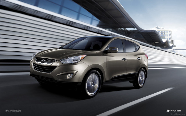 Silver car driving road building free wallpaper for desktop - medium preview image