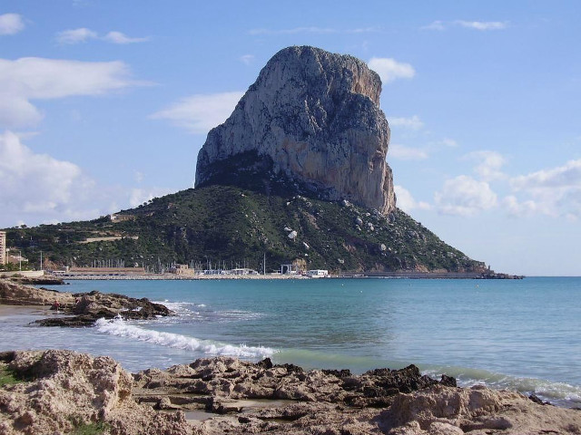 Large rock ocean beach pier free wallpaper for desktop - medium preview image