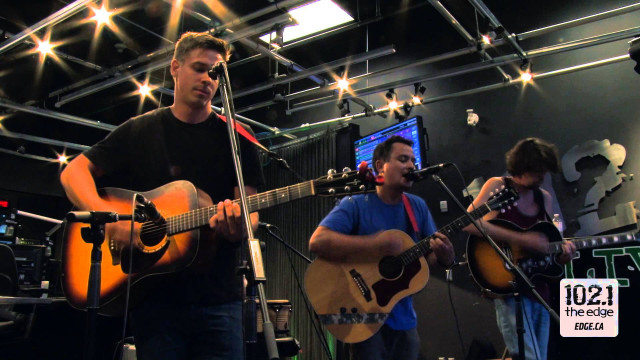 Man playing guitar singing microphone #2 free wallpaper for desktop - medium preview image